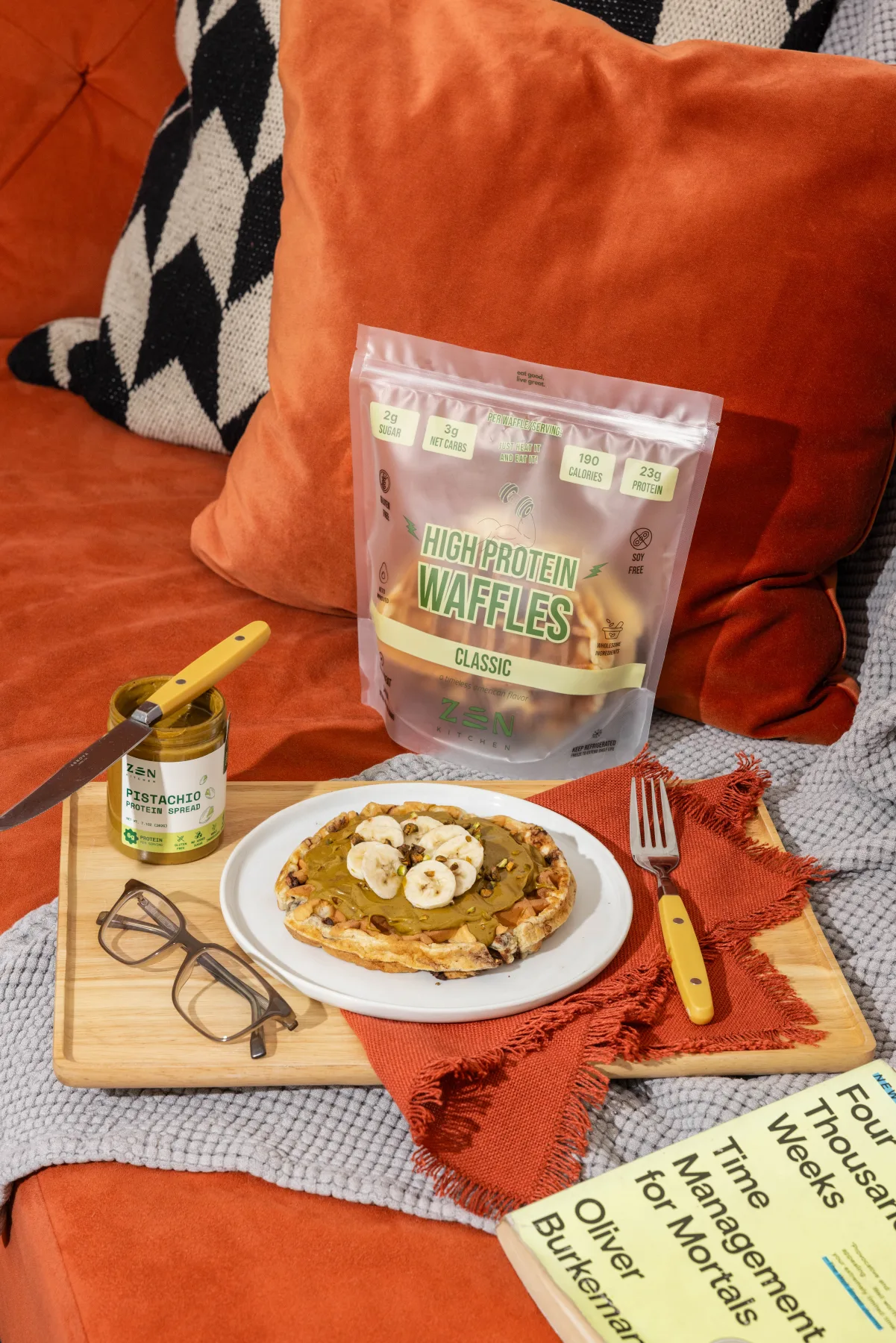 Classic waffles with pistachio spread and a book